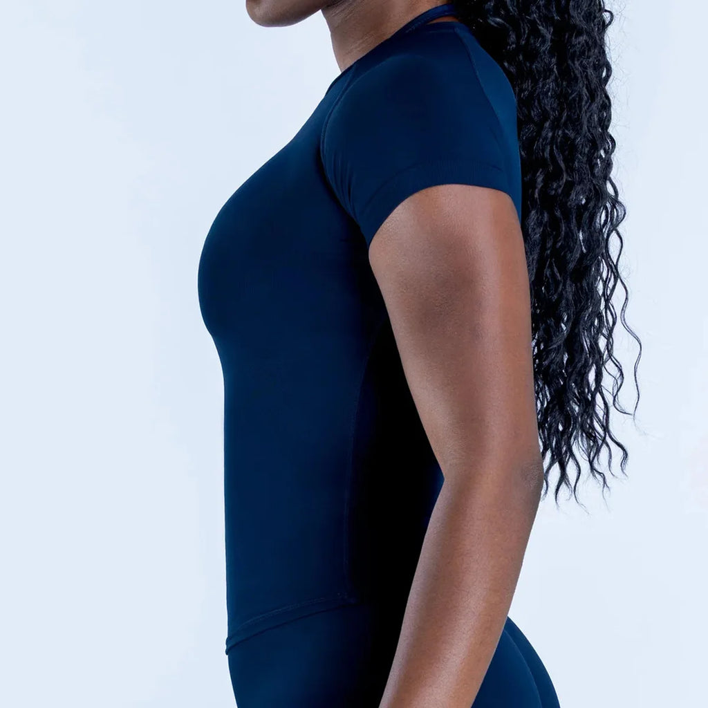 Camiseta deportiva de manga corta de color liso para mujer, con cuello redondo, de punto ajustado, transpirable, para fitness y yoga, nuevo estilo