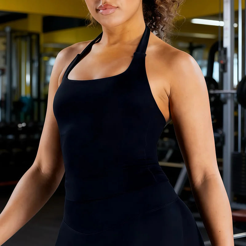 Débardeur de sport long dos nu pour femme, sans coutures, idéal pour le yoga, avec coussinets amovibles pour la poitrine et effet push-up. Haut de fitness et de course à pied.